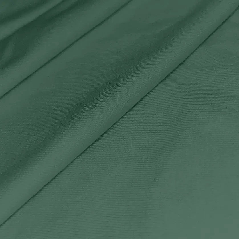 Close-up of Zenboo CloudZen bamboo fabric in green, showcasing its soft texture and smooth, breathable weave.