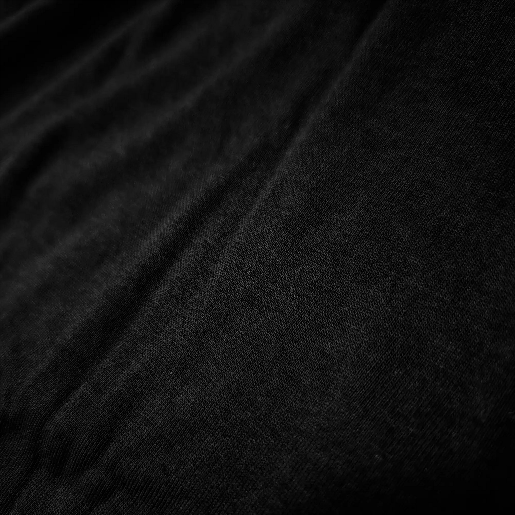 Close-up of Zenboo's CloudZen bamboo fabric in black, showcasing its soft texture and breathable, eco-friendly material.