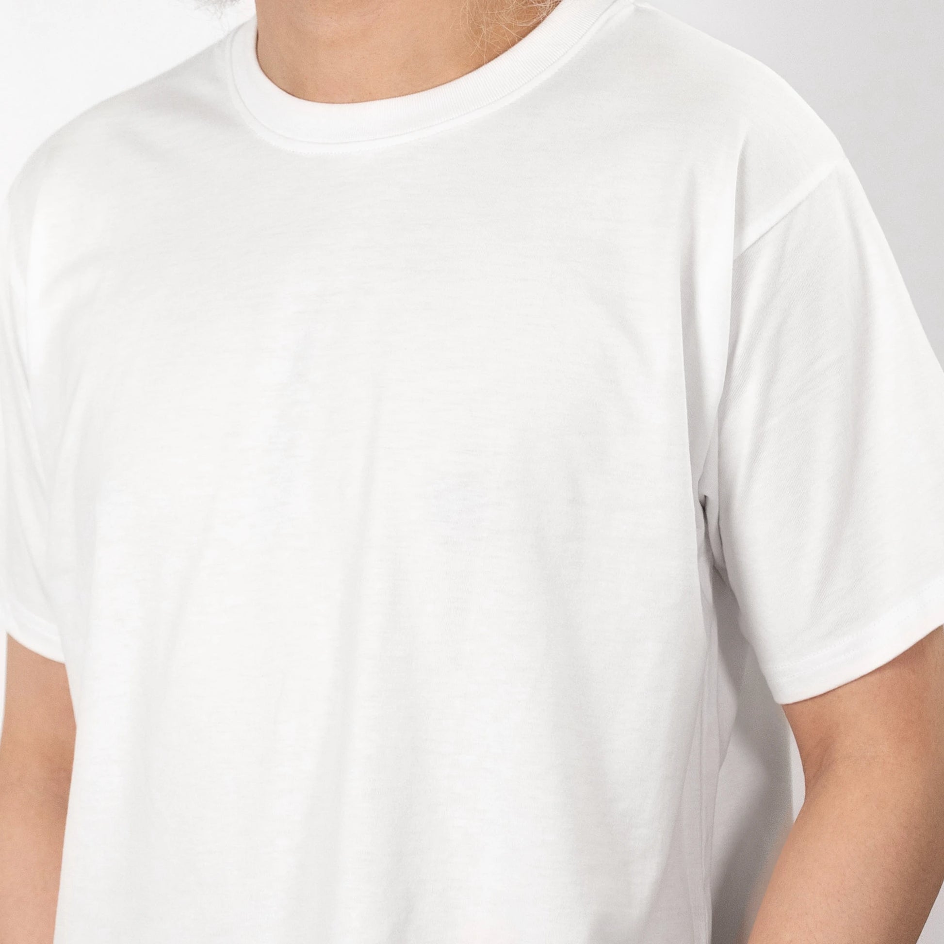 The Zenboo Original T-Shirt in white, a cropped close-up. Sustainable, soft, breathable bamboo fabric.